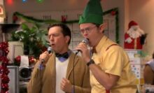 Dwight and Andy singing karaoke together at an office Christmas party.