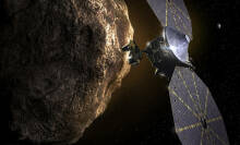 a spacecraft passing a Trojan asteroid