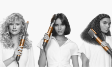 three women in white shirts style their hair using the new dyson airwrap