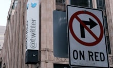 Twitter HQ with a 'no right turn on red' sign