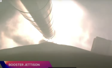 a booster separating from NASA's SLS rocket