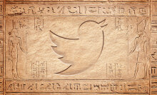 Twitter logo in the style of ancient Egyptian heiroglyphs