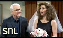Steve Martin standing next to Heidi Gardner who is dressed as a bride. 