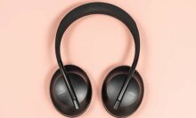 Bose Noise Cancelling Headphones 700 on salmon background