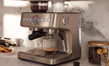 Espresso machine in a white kitchen counter
