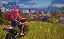 Fortnite player overlooking map on motorcycle