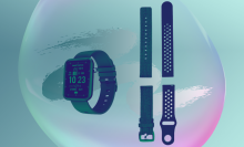 advanced smartwatch with watch bands in teal shade with colorful background