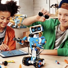 Kids playing with the LEGO Boost Creative Toolbox.