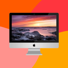 a 21.5-inch imac from 2012 against a red, yellow, pink, and orange background