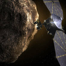 a spacecraft passing a Trojan asteroid