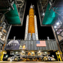NASA's SLS rocket as it starts rolling out to its Kennedy Space Center launchpad.