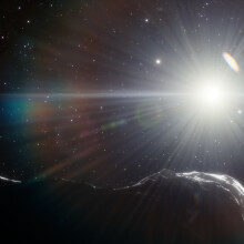 an asteroid in a glare from the sun