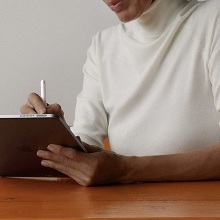 person working on their ipad pro with apple pencil