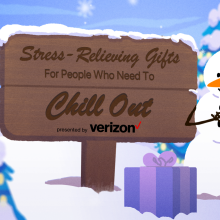 a snowman stands next to a sign with a gift to his left