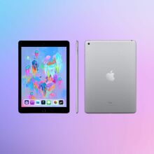 Refurbished 6th-Generation iPad and Accessories Bundle on a colorful background.