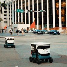 Cartken autonomous robots crossing a street in Miami