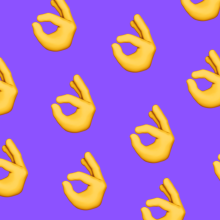 Vector illustration featuring the OK hand gesture emoji on a purple backdrop