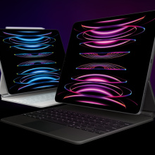 Two iPad Pro tablets on black background