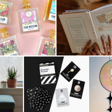 Tarot-themed reed diffusers on pink background, person reading Moon Bath book, plants on windowsill, astrology deck of cards on black and white background, moon-shaped stained glass hanging on wall