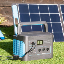homepower one solar generator with portable solar panels in yard