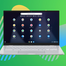 Silver ASUS Chromebook against a green, blue, and yellow background