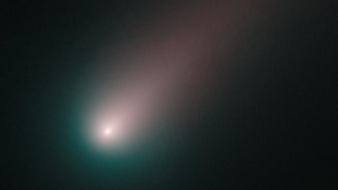 Comet sweeping through the sky