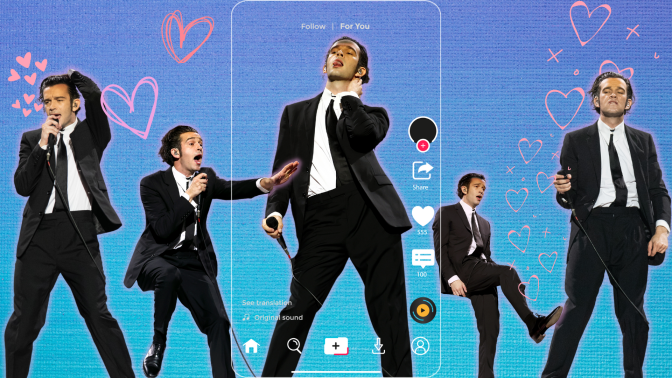 Five images of Matty Healy mid-performance, dressed in a black suit and tie with a mic. The backgrounds have been cut out and Healy's photos have been placed on a blue background with hand drawn pink hearts. The middle cut out of healy is surrounded by an outline of the TikTok app user interface.