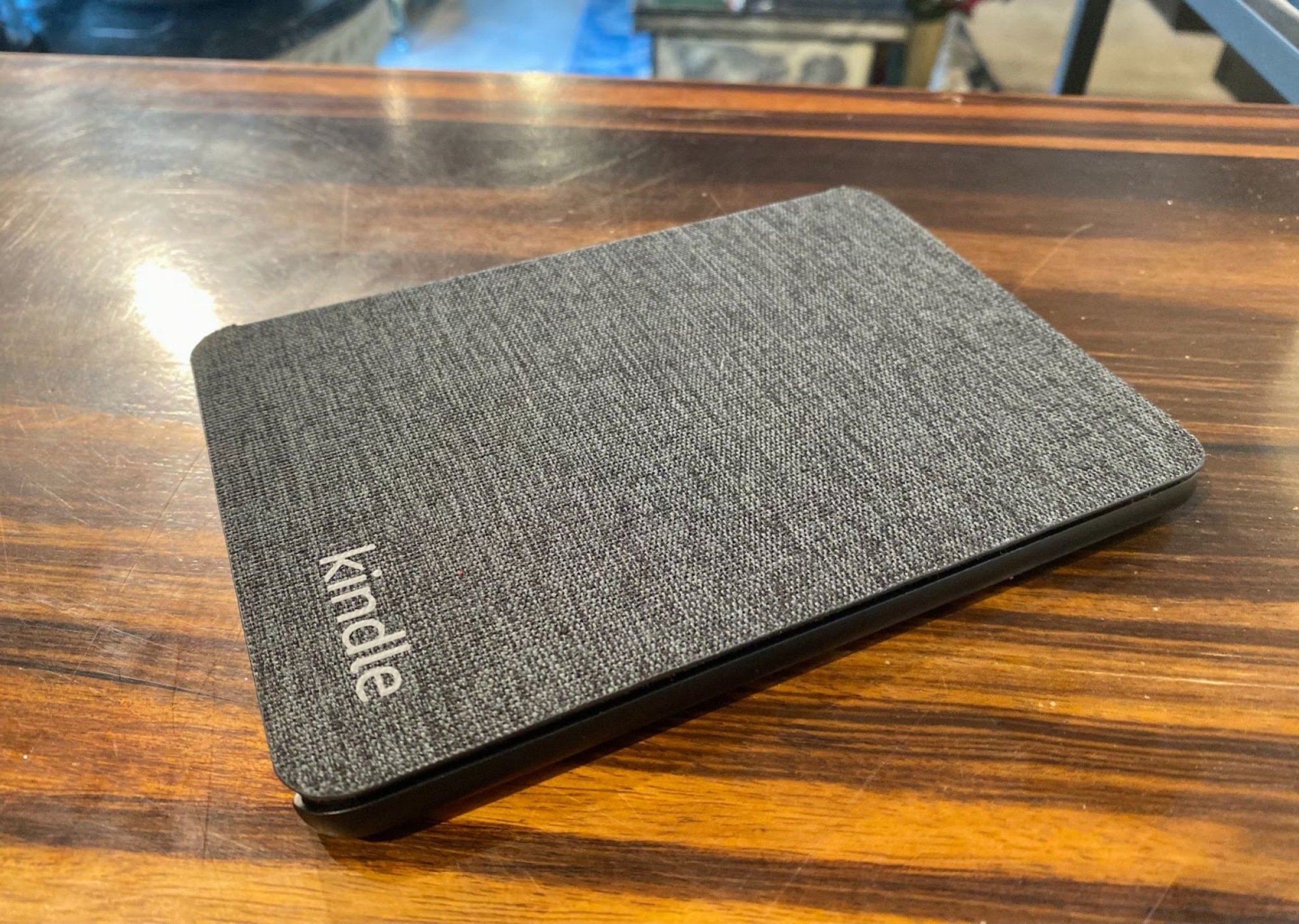 kindle with gray fabric cover