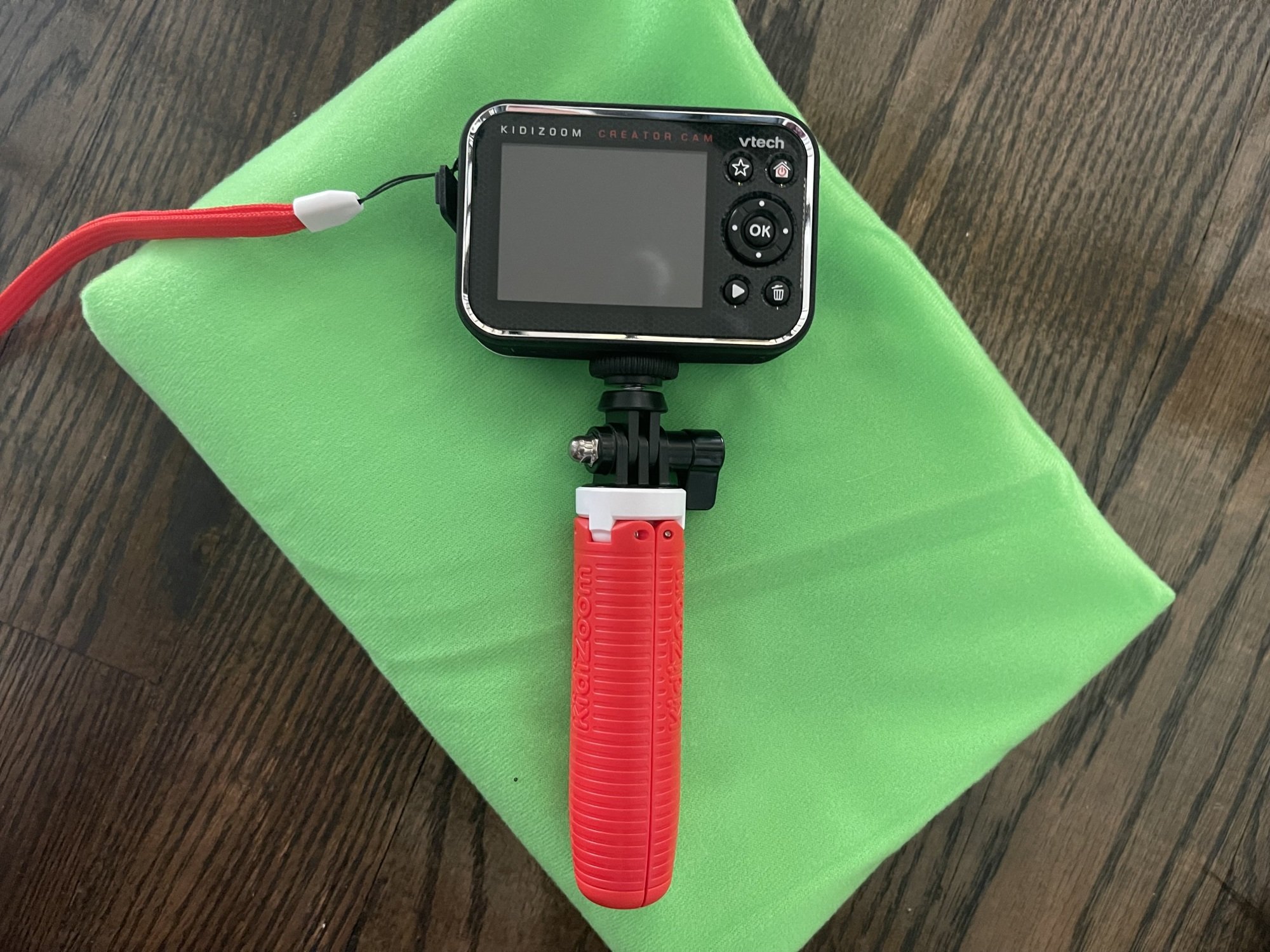 vlogging camera against a folded green screen