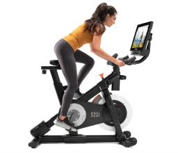 woman pedaling on nordictrack studio cycle 