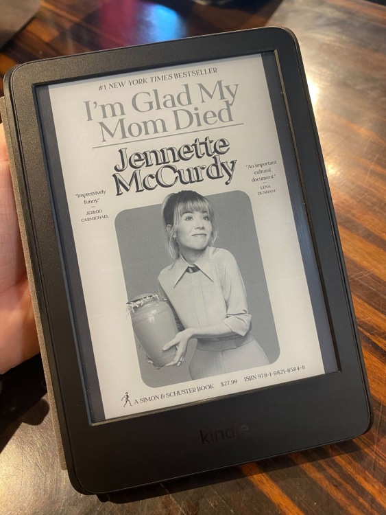 Kindle with Jenette McCurdy's "I'm Glad My Mom Died" onscreen