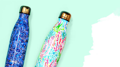 Blue and green-pink patterned water bottles with silver lids