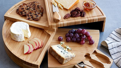 Circular wooden cheese board that opens